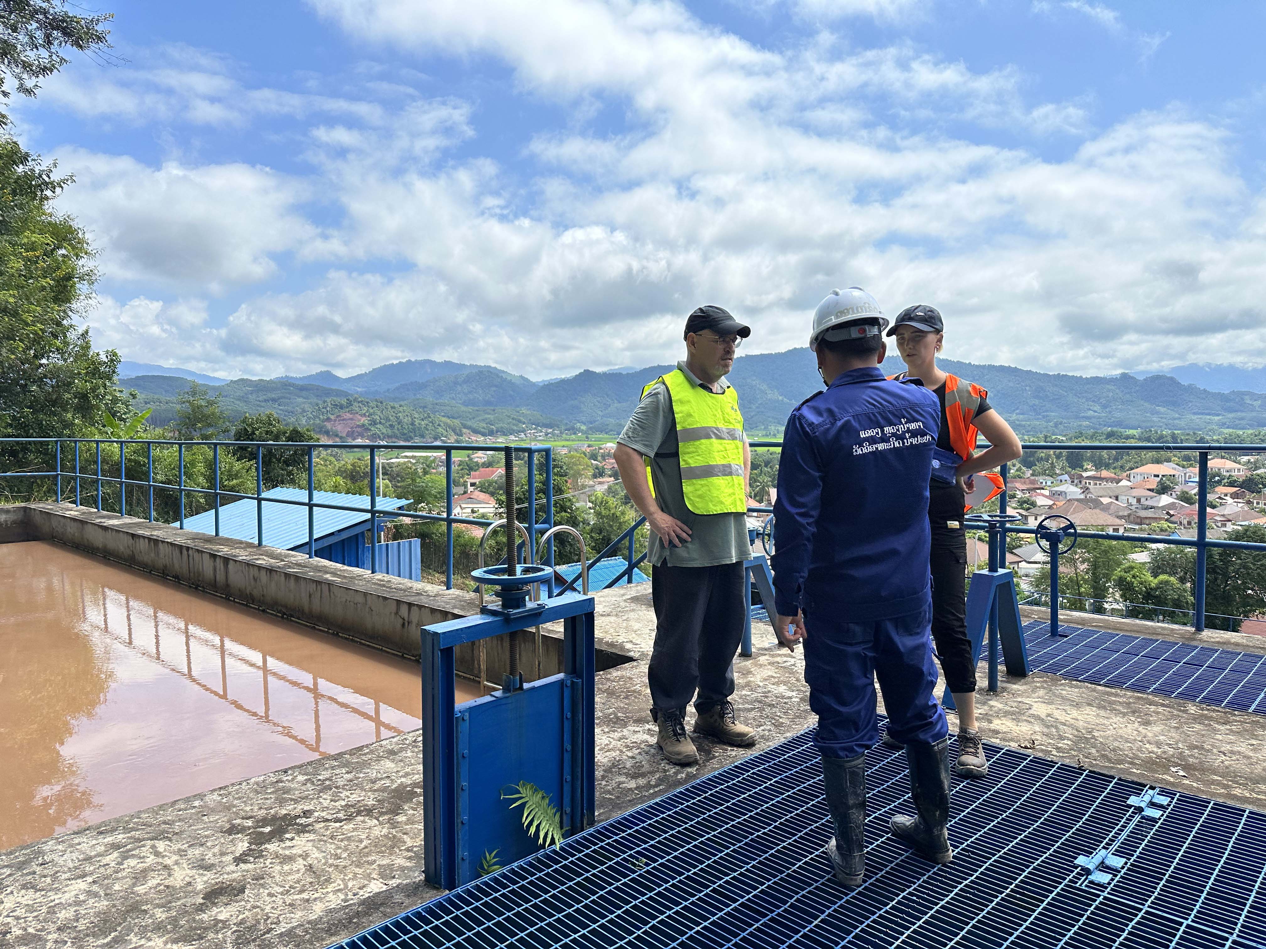 Professionals supervising Laos Water Plant.jpg