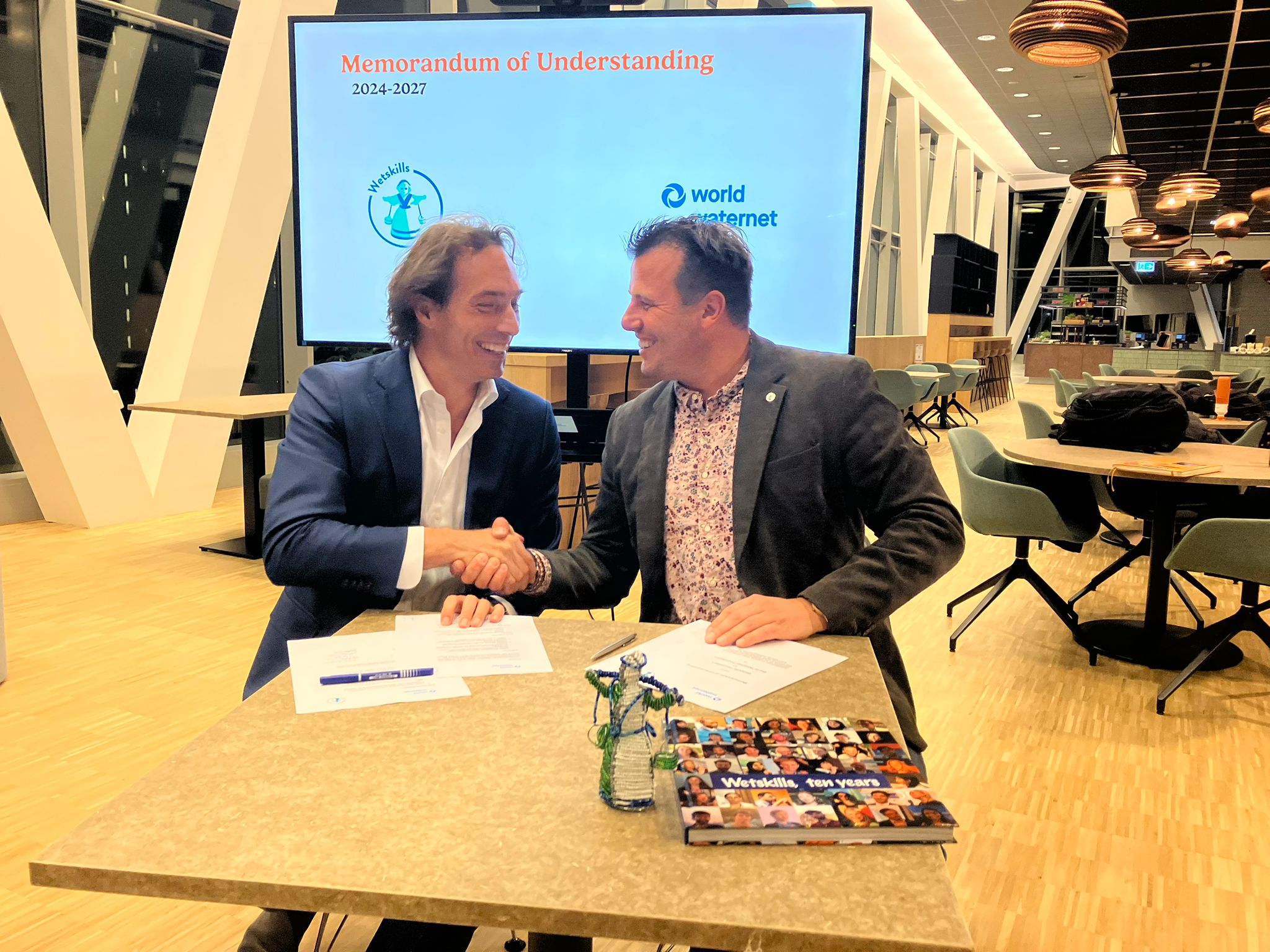 World Waternet CEO Frodo van Oostveen signing MOU with Wetskills.jpeg