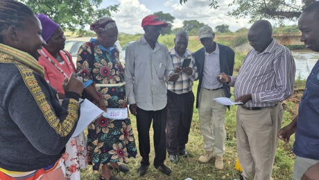 Group of citizen scientist conducting water tests